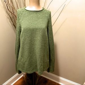 Carolyn Taylor green sweater
